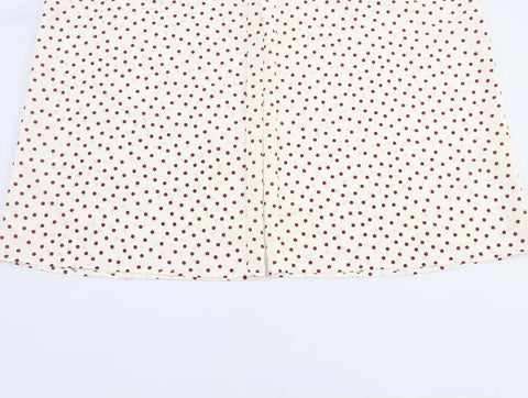 New Fashion V-Neck Backless Decorate Zipper Dots Jumpsuit CODE: KAR4151