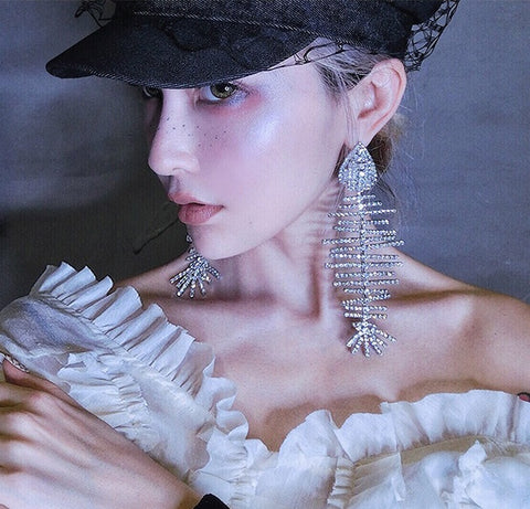 Curved line fish bone earrings CODE: mon1659